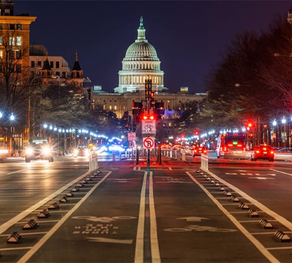 US Capitol building at night from street level